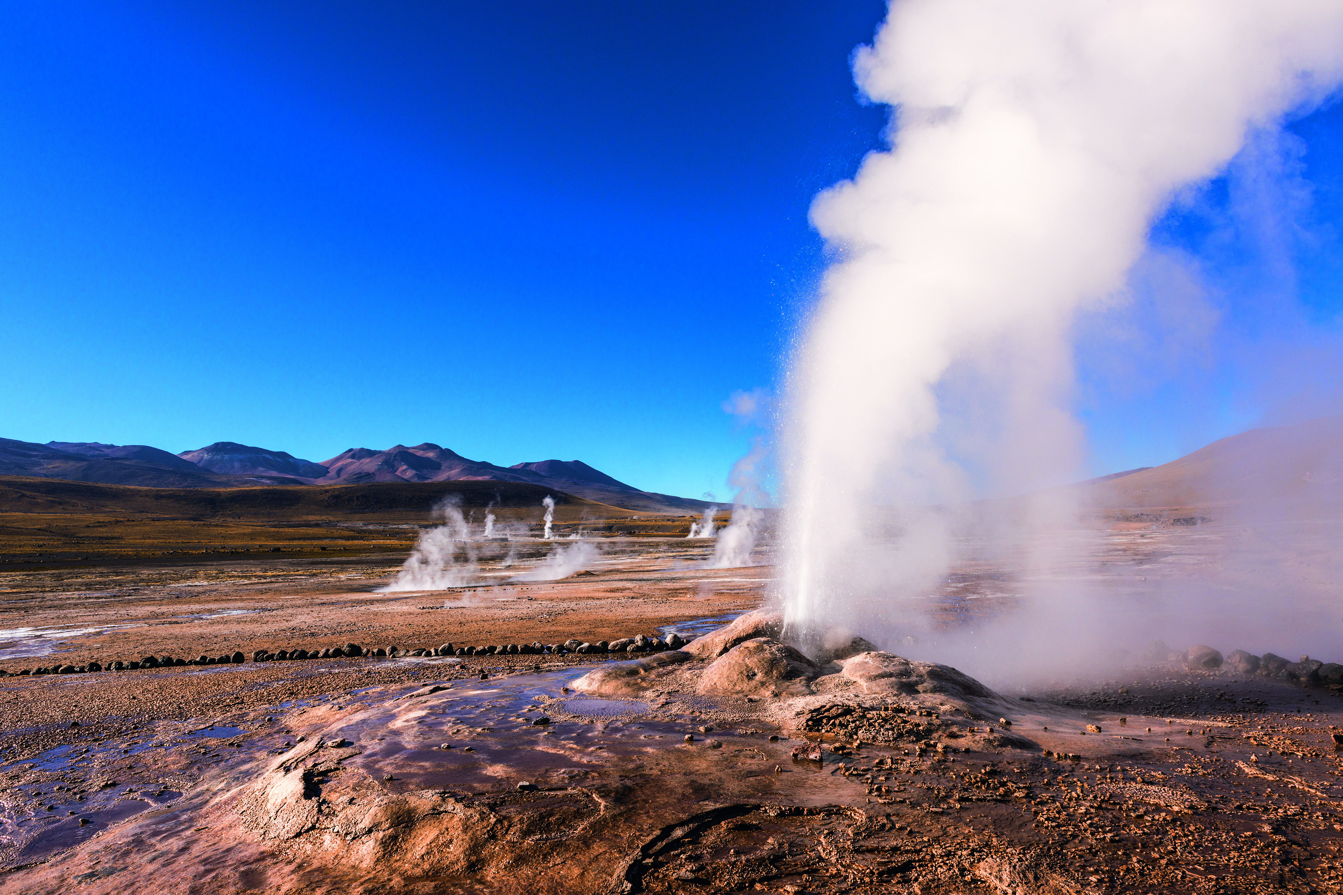 Geyser erupting activity in the Geysers del Tatio field in the Atacama Desert