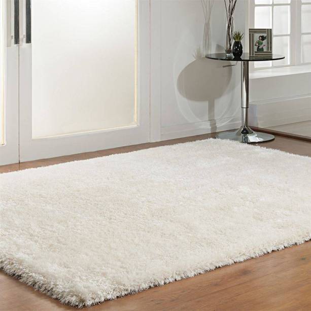 Tapete Palma, de poliéster, da Niazitex, de 3 x 2 m. <a href="https://www.shoptime.com.br/produto/35277942/tapete-palma-2-00-x-3-00-niazitex-branco" target="_blank" rel="noopener">Shoptime</a>, 1179,90