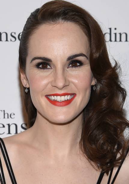 <strong>Michelle Dockery:</strong> começando a se aventurar no mundo do batom laranja? Comece pelas nuances mais escuras, como o telha, e capriche no lápis preto.