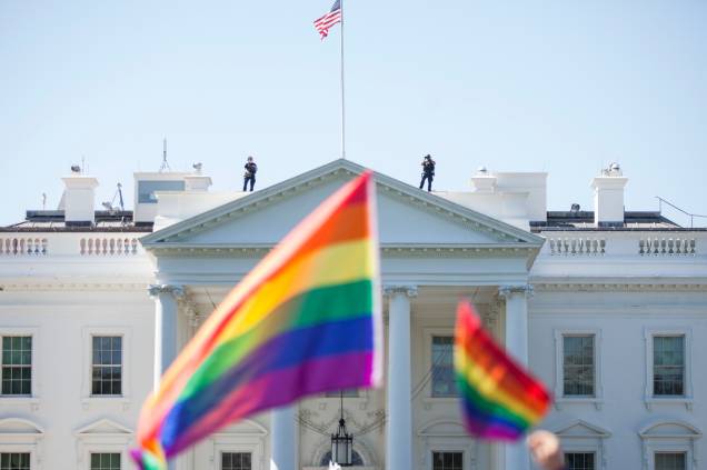 Seguranças de Casa Branca observam a Parada do Orgulho LGBT em Washington, capital dos Estados Unidos, em 2017 Seguranças de Casa Branca observam a Parada do Orgulho LGBT em Washington, capital dos Estados Unidos, em 2017
