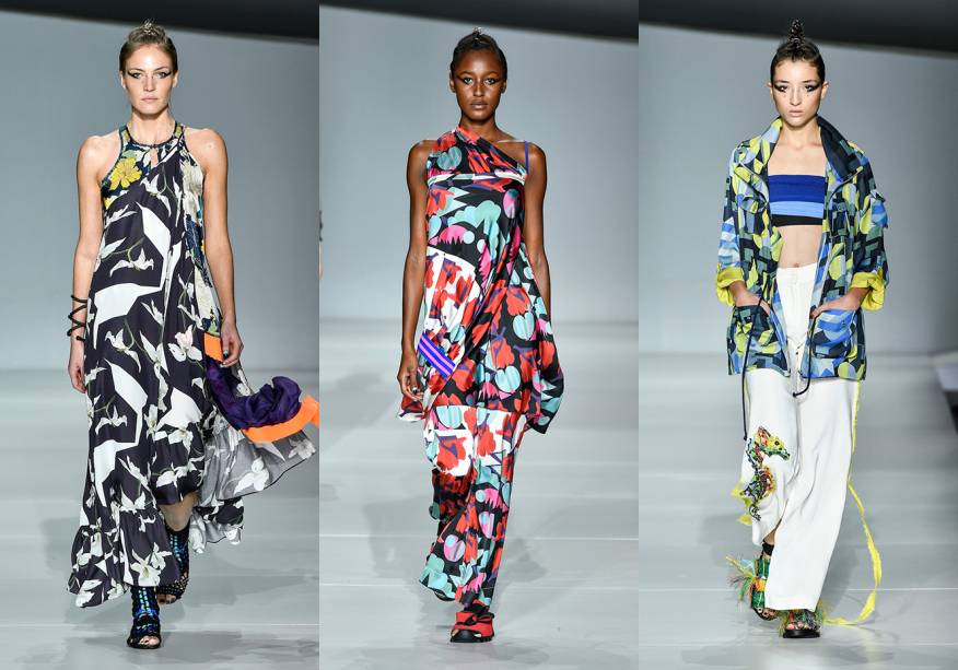 De volta ao line-up de desfiles do evento de moda mineira, a<strong> Anne Est Folle</strong> renovou suas características estampas multicoloridas com shapes mais volumosos e amarrações estratégicas. Os prints são inspirados na geometria dos anos 1920 e em mosaicos ornamentais. Seguindo a linha maximalista das roupas, bijoux grandes e sapatos em crochê bordado e com fiapos fluo deram o toque final. De volta ao line-up de desfiles do evento de moda mineira, a<strong> Anne Est Folle</strong> renovou suas características estampas multicoloridas com shapes mais volumosos e amarrações estratégicas. Os prints são inspirados na geometria dos anos 1920 e em mosaicos ornamentais. Seguindo a linha maximalista das roupas, bijoux grandes e sapatos em crochê bordado e com fiapos fluo deram o toque final.