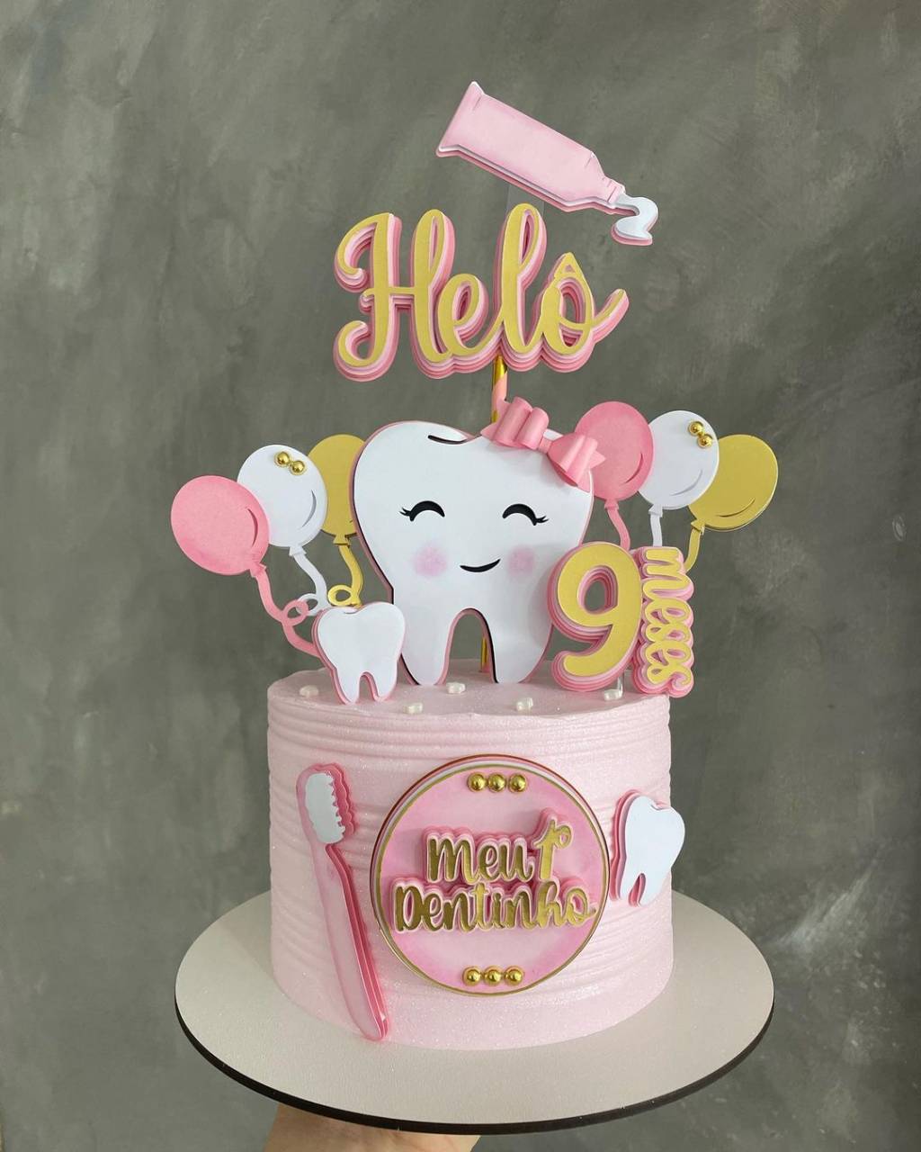 Bolo primeiro dentinho cor de rosa Bolo primeiro dentinho cor de rosa