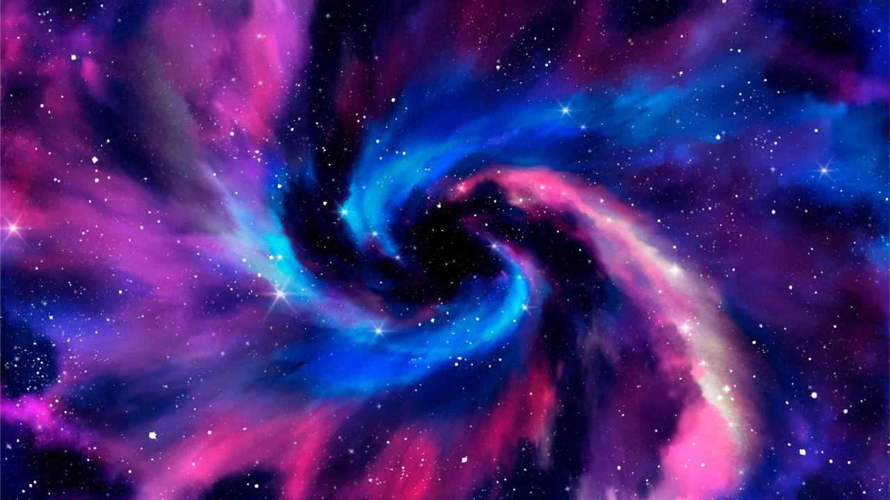 Galáxia nas cores azul, rosa e roxo.