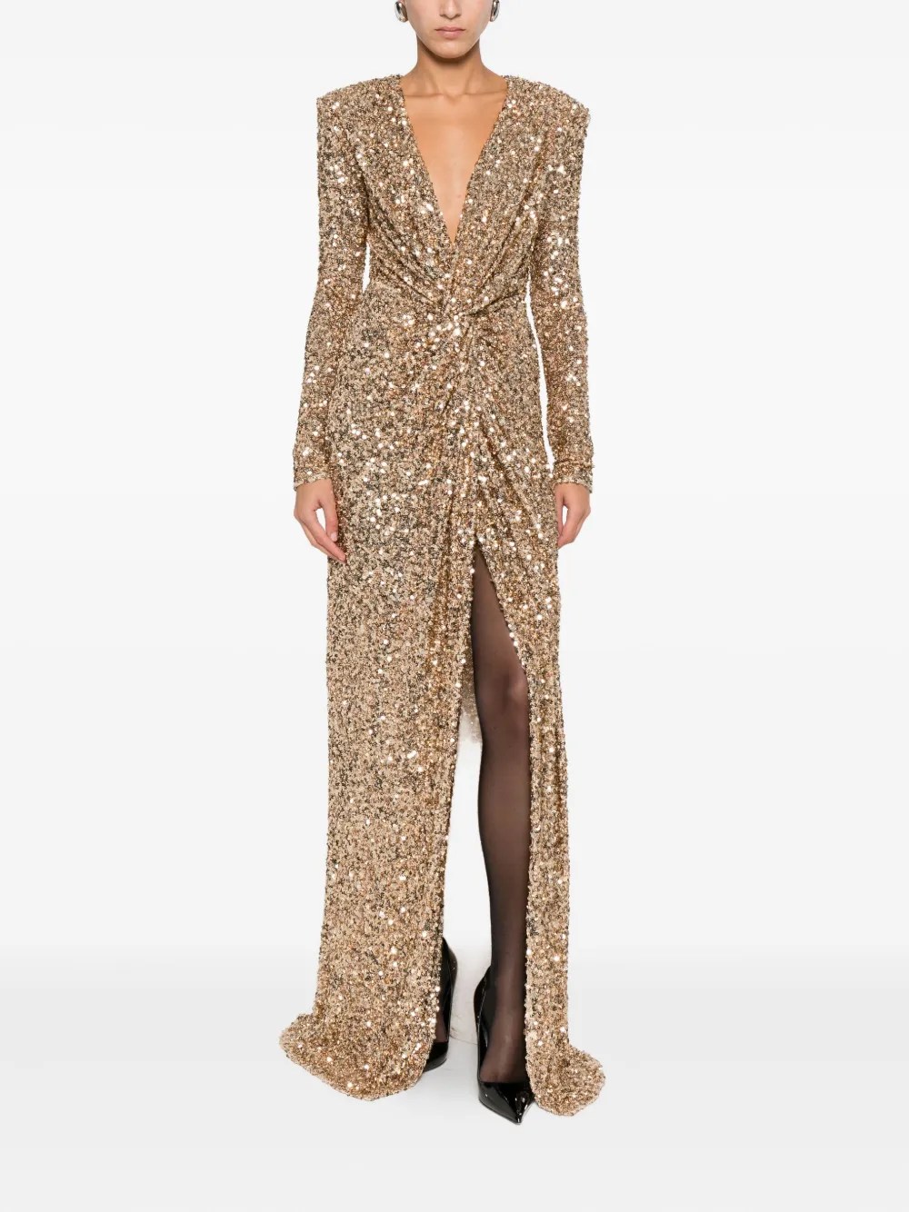 Imagem de vestido dourado brilhate semelhante ao da personagem de Os donos do jogo