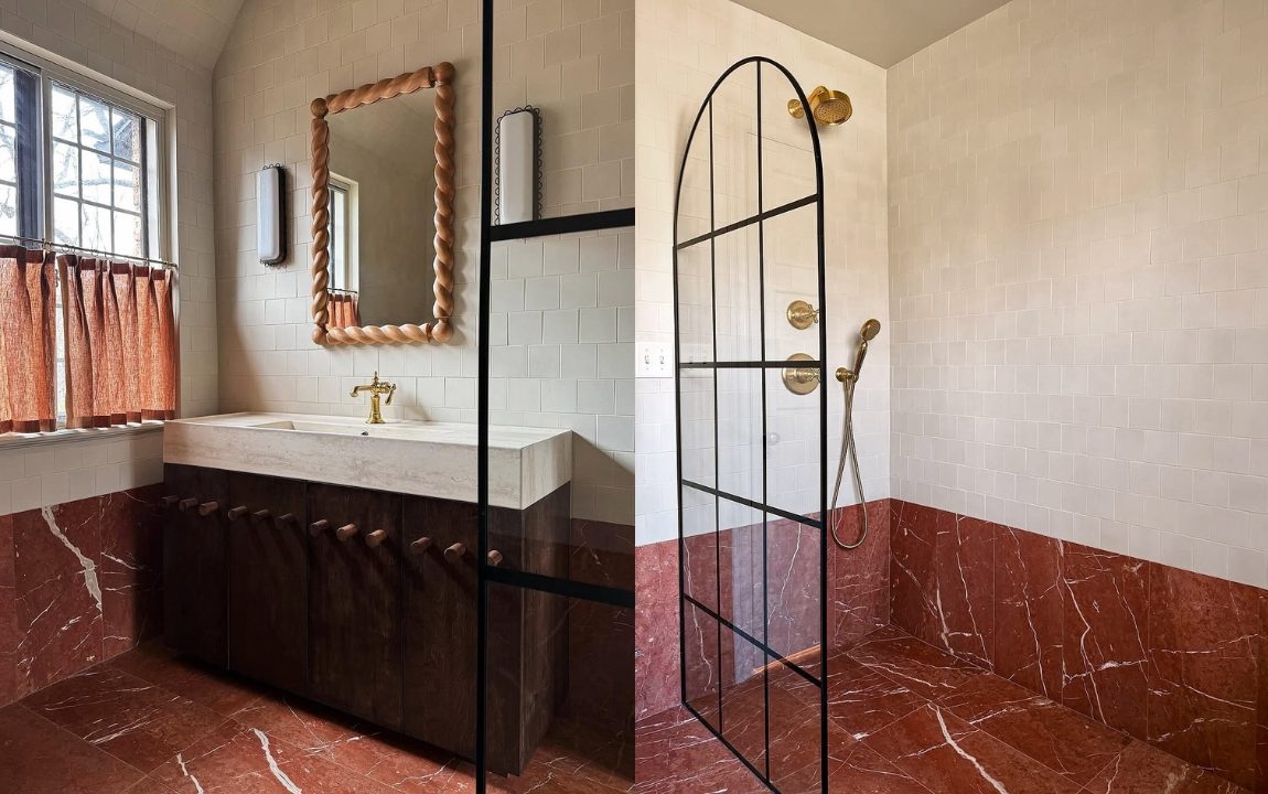 Banheiro com m&aacute;rmore vermelho no piso de ocupando meia parede