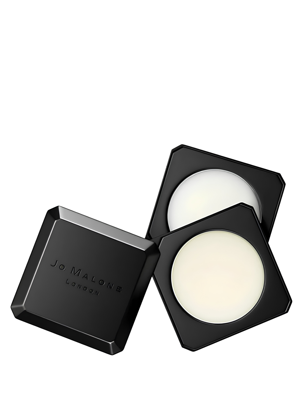 Tr&ecirc;s estojos quadrados pretos de perfume s&oacute;lido Jo Malone London, um fechado e dois abertos revelando o produto cremoso e branco